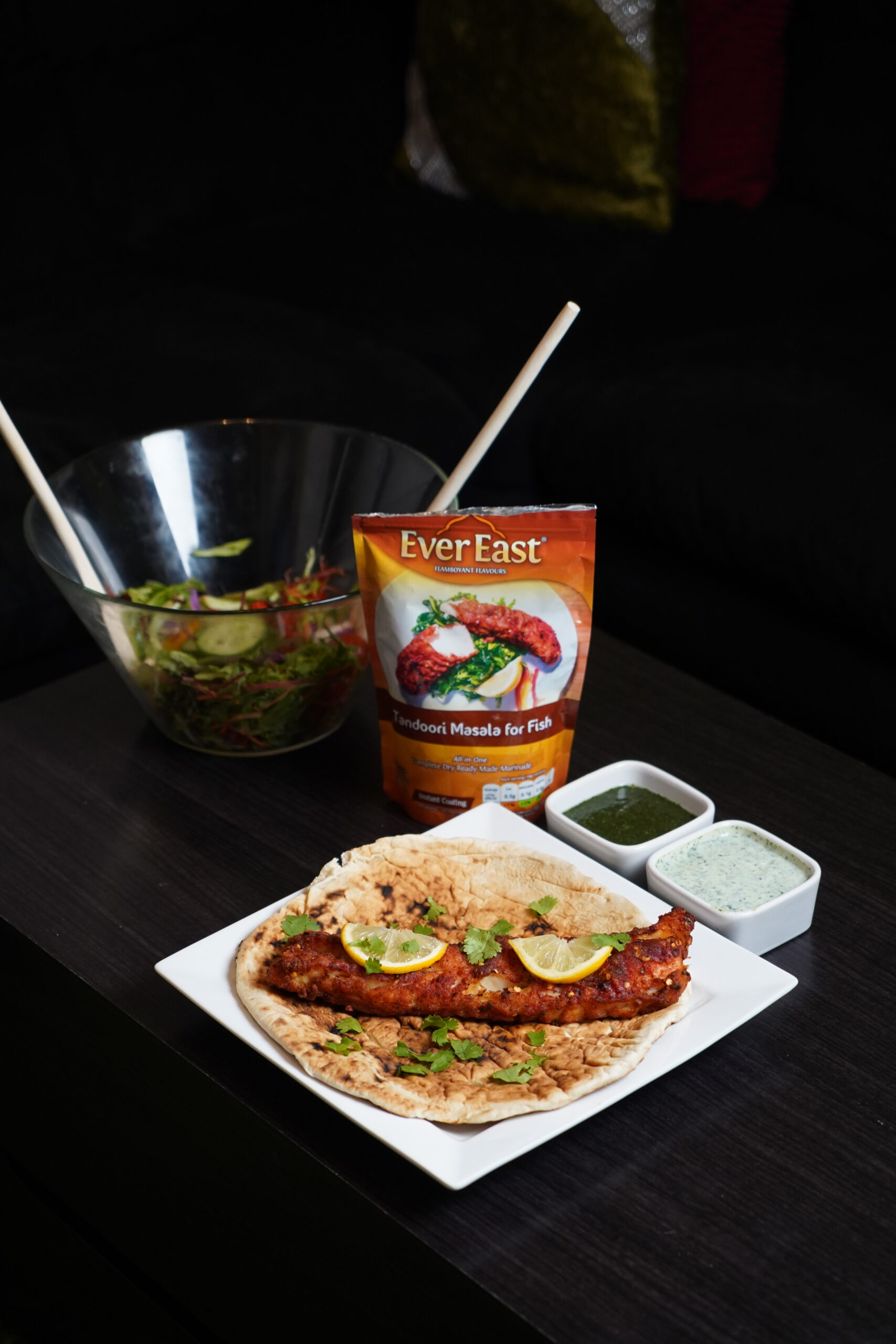 Ever East tandoori lamb flatbread platter with spiced lamb, onions, salad and chutney-styl