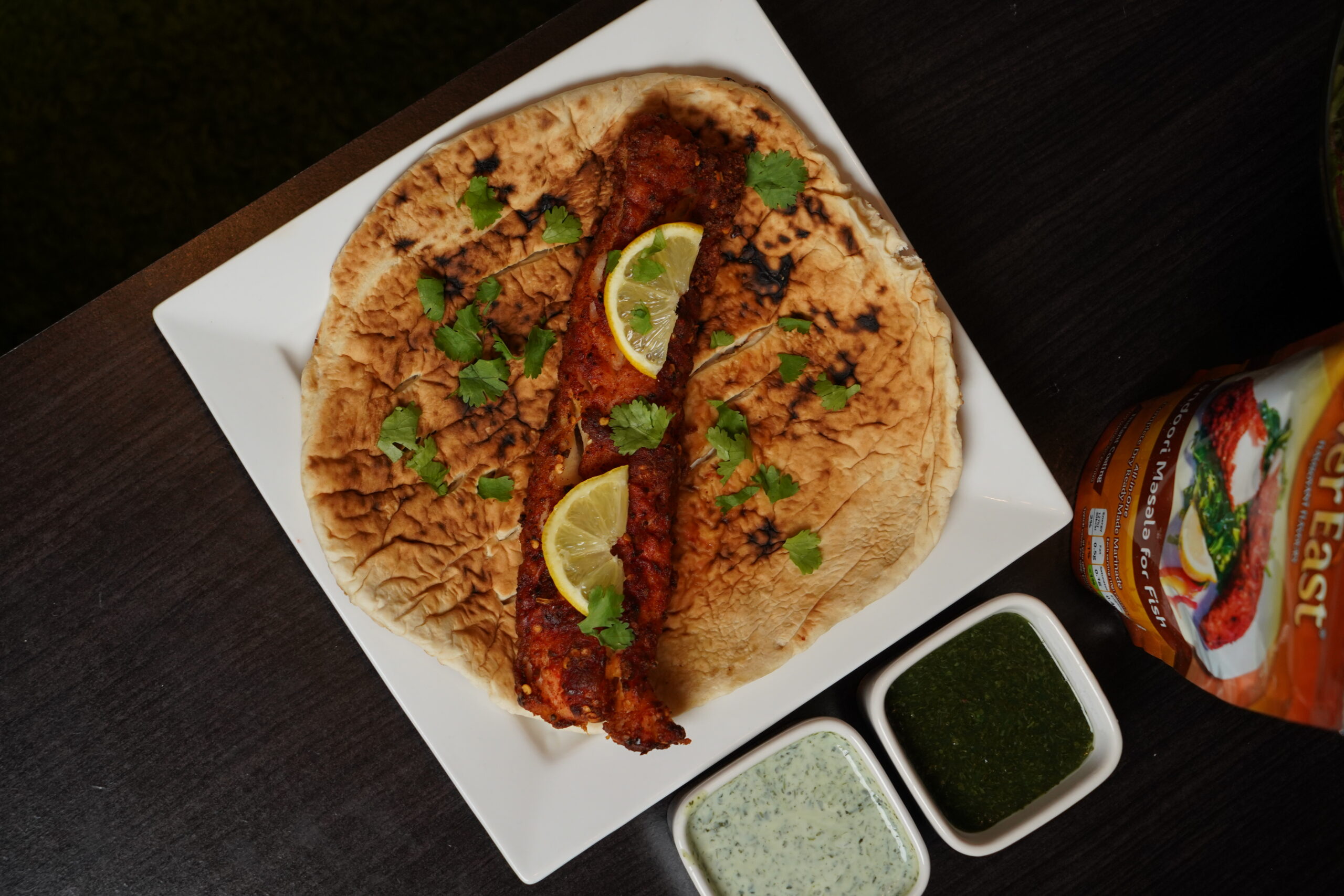 Ever East Tandoori Masala for Fish product pack with cooked tandoori fish and seafood dinn