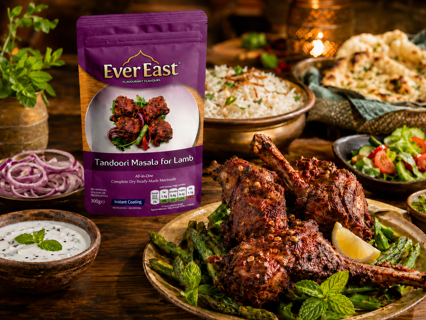 Family-style table spread with Ever East tandoori lamb or beef chops, basmati rice, naan,